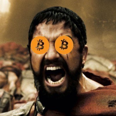 The image features a man with a beard wearing a red robe, who has two orange circles on his face as if he were wearing glasses or goggles. The caption reads "Have yall considered not selling coins until we breach ATHs so that we can transition from PvP to PvE and dump on NPCs instead of dumping on each other". This image seems to be related to a post about the gaming industry, possibly discussing the idea of not selling coins for PvP (player vs. player) games and focusing more on PvE (player vs. NPC).