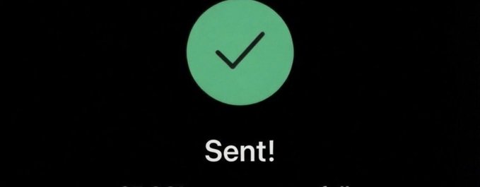 A green circle with a checkmark above the word 'Sent!' on a black background, indicating a successful message delivery.