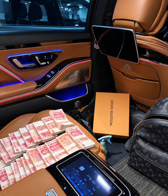 A luxury car interior showcases stacks of 100 Chinese yuan banknotes piled on the tan leather upholstery, alongside a Louis Vuitton monogram bag and a matching branded shopping bag. The image symbolizes sudden wealth and financial success, illustrating the post's narrative about a friend who turned a 50,000 yuan crypto investment into 53,000 yuan—a modest but tangible profit representing "the first bucket of gold."