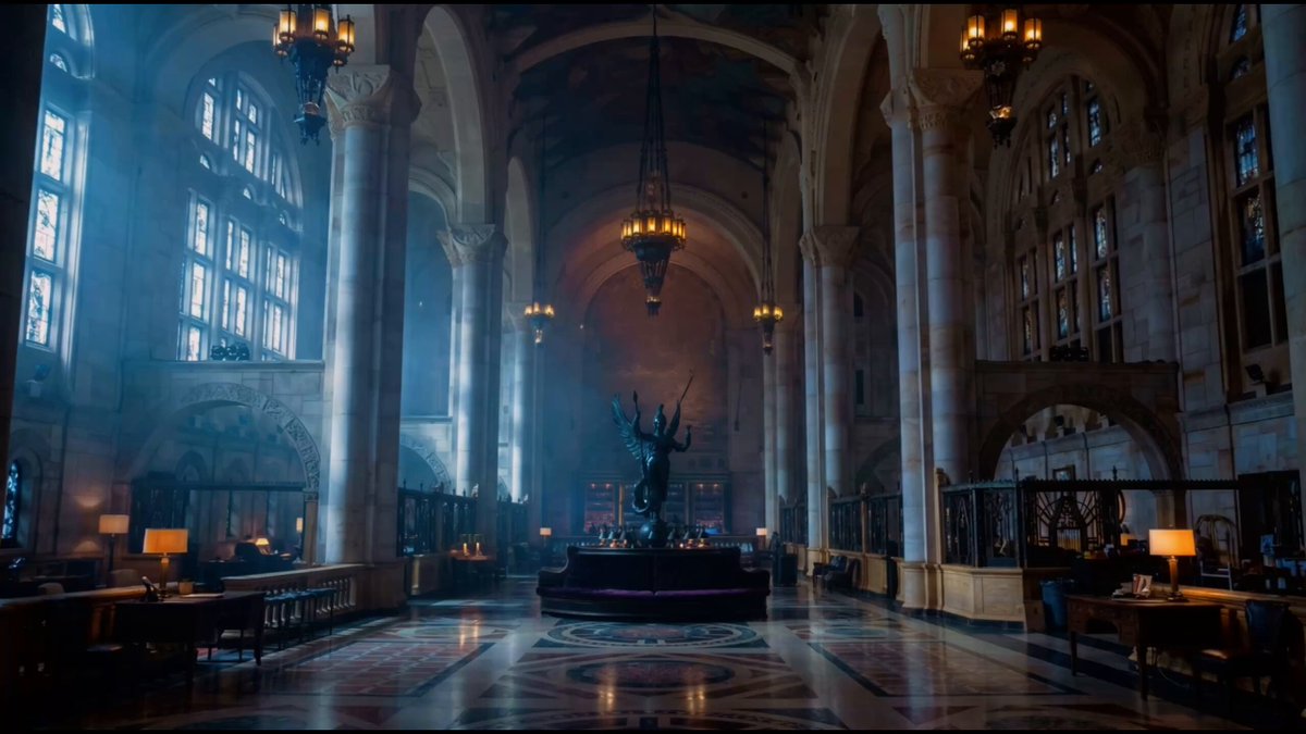 The image shows a large room with a statue of a woman holding a sword at its center. There are several people standing around the room, possibly admiring the statue or discussing the collectibles experience. The room has a grand appearance, featuring high ceilings and large windows that allow natural light to illuminate the space. The post about the collectibles experience is likely related to this room, as it seems to be a central location for enthusiasts to gather and discuss their interests in vintage items.