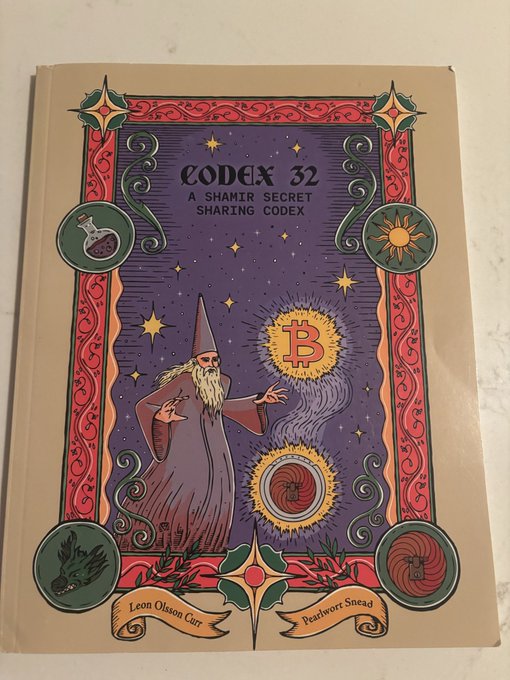 A book cover titled "CODEX 32: A SHAMIR SECRET SHARING CODEX" by Leon Olsson Carr and Fearwort Snead, featuring an illustrated wizard conjuring a Bitcoin symbol alongside mystical and alchemical imagery including a raven, potion, and sun.