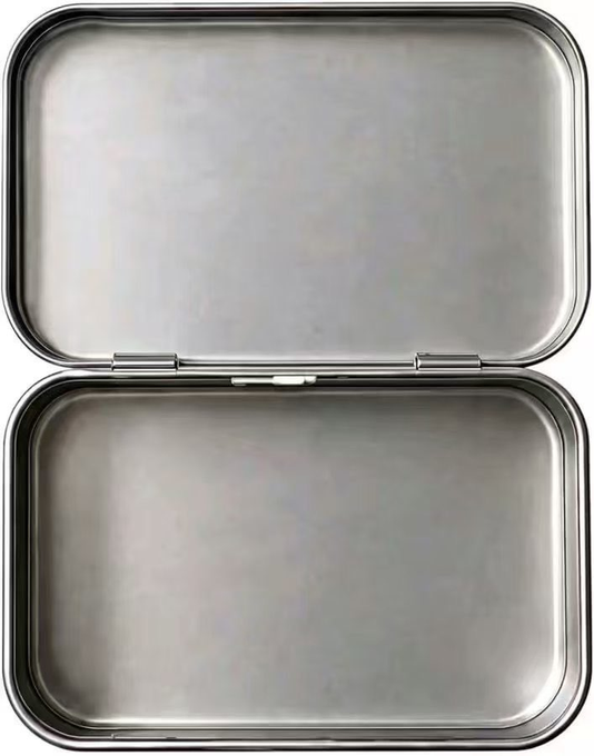 An open, empty stainless steel hinged tin box with two rectangular compartments viewed from above against a white background.