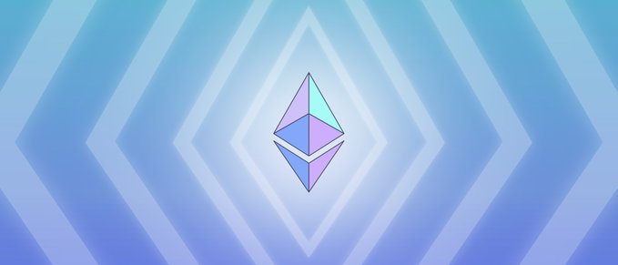 A blue geometric wallpaper featuring a diamond shape with pastel purple and teal triangular segments, set against layered diamond patterns in various shades of blue.