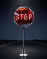 An album cover or promotional image showing a red STOP sign in a dark, foggy environment with 'TWISTY' text at the bottom.