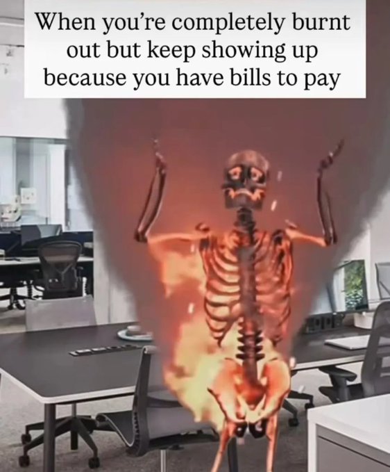 A humorous meme showing a burning skeleton overlaid on an office scene with the caption 'When you're completely burnt out but keep showing up because you have bills to pay'.
