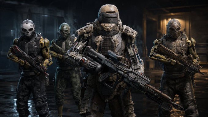 Four armored soldiers in futuristic combat gear and helmets stand holding large weapons in a dark, industrial setting.