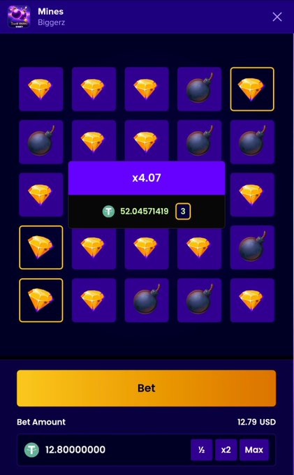 A screenshot of the Biggerz "Mines" game showing a 12.80 USDT bet that hit a 4.07x multiplier, winning 52.04571419 T, with 3 diamonds selected on the 5×5 grid.