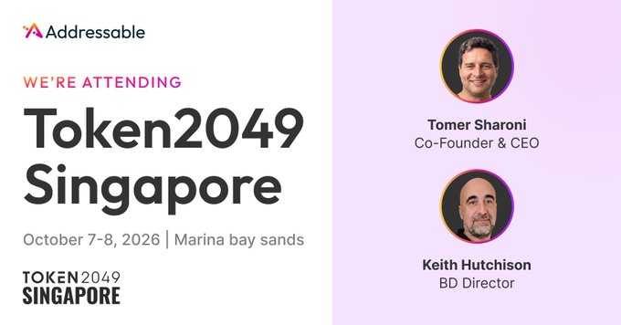 A promotional graphic for 'Addressable' announcing they are attending Token2049 Singapore on October 7-8, 2026, at Marina Bay Sands, featuring photos of Co-Founder & CEO Tomer Sharoni and BD Director Keith Hutchison.