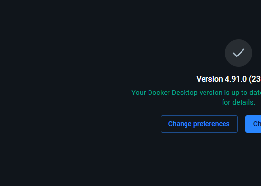 Docker Desktop interface displaying Version 4.91.0 (23...) with a confirmation checkmark, a message stating "Your Docker Desktop version is up to date," and a "Change preferences" button, indicating a successful software update.