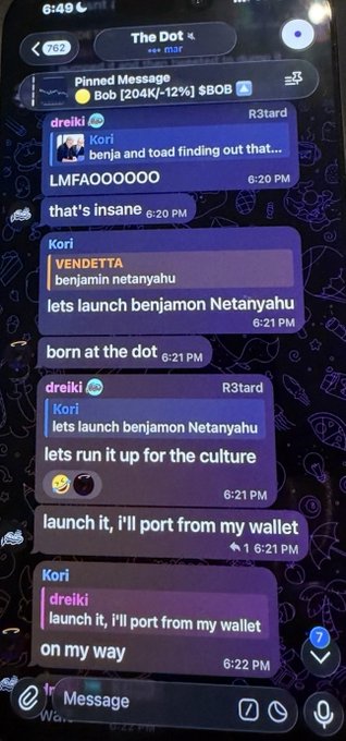 A screenshot of a Telegram group chat called "The Dot" where members coordinate launching a meme token called "benjamin netanyahu" and "lets launch benjamin Netanyahu" on the Monad blockchain, with one user (Kori) offering to provide their wallet for the launch. The post highlights the irony of the group having a combined $54 balance despite calling themselves "pre-rich," as the chat shows informal memecoin coordination rather than serious trading activity.