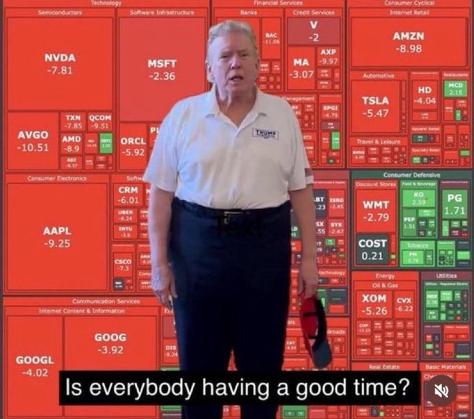 The image features a man standing against a red background with a white shirt and blue pants. He appears to be talking about Bitcoin or Ethereum, possibly discussing their value or importance. The text "Is everyone having a good time?" can also be seen in the image.