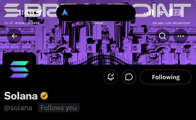 The image shows a social media post featuring a purple background with an overlay of a city skyline, along with a black box containing a Twitter logo and text. The main focus of the post is the hashtag "solana" written in white letters at the bottom right corner. The caption reads "Following you", indicating that the person who posted this content has tagged themselves or their followers using the hashtag "solana".