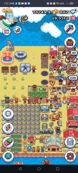 The image shows a screenshot of a mobile device screen displaying a map or game interface with various elements, such as buildings, people, and objects. The main focus appears to be an expansion area for a video game called "Sunflower Land". The game is set in a virtual world where players can build their own land, farm animals, and interact with other players online. The post also mentions that the player has been busy doing many things at @0xSunflowerLandFlower #SunflowerLandFarm #SunflowerLandWeekly #Ronin_Network".