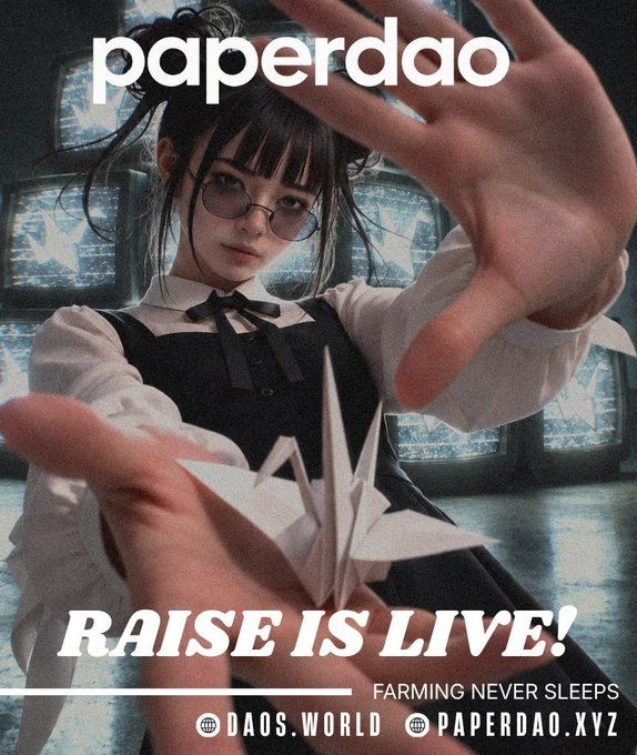 A promotional image for 'paperdao' featuring a woman in glasses reaching toward the camera with a white origami flower, with text 'RAISE IS LIVE! - FARMING NEVER SLEEPS' and 'DAOS.WORLD PAPERDAO.XYZ'.