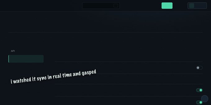 A dark-themed dashboard interface with the text 'i watched it sync in real time and gasped' overlaid diagonally across the screen.