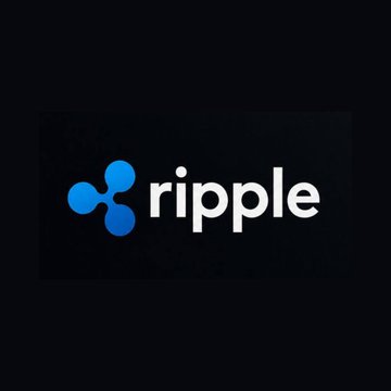The image displays the Ripple logo, featuring its blue tricolor symbol alongside the company name in white text on a black background. This logo represents Ripple, the company behind the grant program highlighted in the announcement, which awarded $250,000 to 25 veteran- or military spouse-owned businesses through its Ripple Effect Certified Veteran Employer Grants Program.
