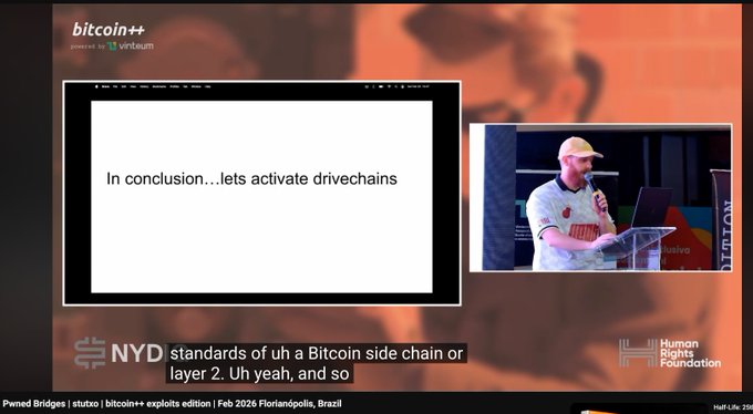 A presentation slide titled 'bitcoin++' with the text 'In conclusion…lets activate drivechains', showing a man speaking at a podium.