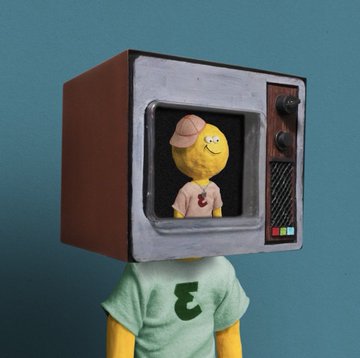 A 3D-rendered figure with a vintage CRT television for a head, displaying a yellow cartoon character wearing a cap, while the body wears a green shirt with the number 3 against a blue background.