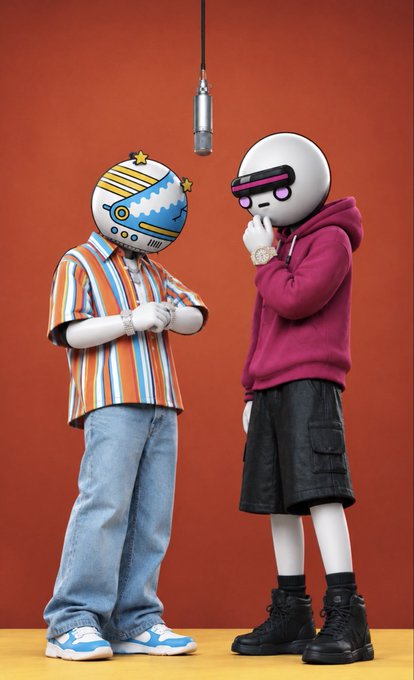 Two figures with cartoonish, robotic heads stand in front of a microphone against an orange backdrop; one wears a striped shirt and jeans, the other a pink hoodie and black shorts.