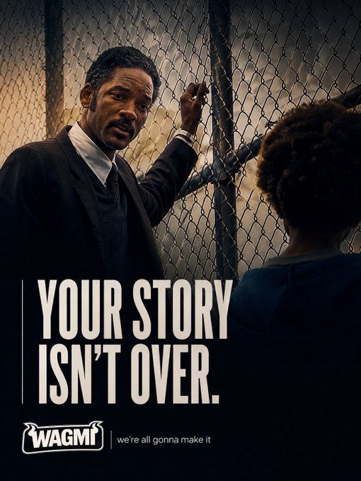 A man in a suit leans against a chain-link fence while speaking to another person, with the bold caption "YOUR STORY ISN'T OVER." alongside the "WAGMI - we're all gonna make it" logo.