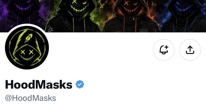 A Twitter/X profile for 'HoodMasks' (@HoodMasks) with a verified checkmark and a neon green smiling hooded mask logo, with a banner showing colorful hooded mask designs.