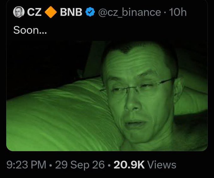 A screenshot of a tweet by CZ (Changpeng Zhao) with the BNB verified badge, captioned 'Soon...', showing a green-tinted nighttime video thumbnail of a person lying in bed, posted at 9:23 PM on 29 Sep 26 with 20.9K views.