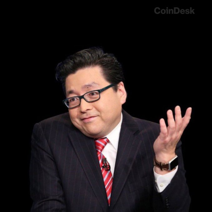 A man in a pinstripe suit, red tie, and glasses gestures with an open hand while looking to the side, photographed against a black background with the "CoinDesk" watermark in the upper right corner. His animated expression and gesture complement the caption "Yes. It's true," suggesting a moment of confirmation or admission in an interview setting.