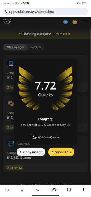 The screen of a cellphone displaying an advertisement for app "Wallchain". The screen features an award scorecard with a gold bird logo, indicating that user number 772 has won this contest. It also shows other awards such as " Congrats" and " Copy image". In addition to the awards, it mentions " Share to X". There are three instances of text in different colors on the app's home screen, including some related to the app itself and other content from the same post or another source.