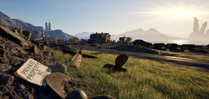 A scenic landscape featuring a dirt road, old buildings, and a 'PRIVATE PROPERTY' sign in the foreground, set against distant mountains.