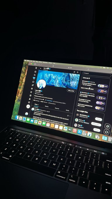 A laptop displays the X (formerly Twitter) social media platform open in dark mode, showing various posts and trending content on the feed. The user appears to be browsing their social media feed, which aligns with the post expressing enthusiasm for web3, a decentralized internet ecosystem often discussed and promoted through social platforms like X.