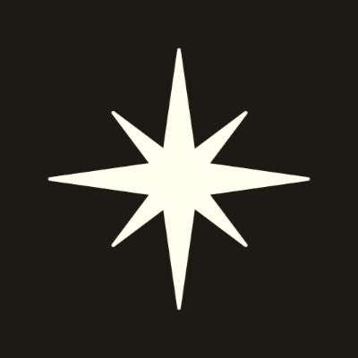 A stylized white eight-pointed star glows against a black background, evoking a sense of newness and opportunity that aligns with the post announcing the launch of the "BULK" trade airdrop and the giveaway of 25 early access codes.