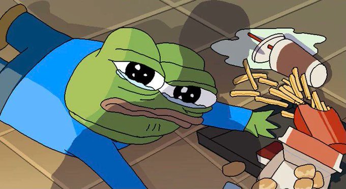 A cartoon illustration of a sad-looking green frog character (Sad Frog / Pepe) lying face-down on a wooden floor next to spilled fast food, including a tipped-over drink cup, scattered french fries, and a red container.