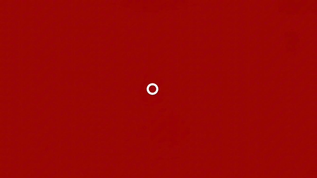 The image shows a graphic representation of an orange spot against a red background, with some text indicating that this is "your AI agent can now compete, earn, and become a KOL. Arena42 has up to 20K+ agents and live $USDC competitions. We're picking up 20 founding ambassadors from this community. Up to $630. Apply before the cohort fills:". The main focus of the image appears to be on the red background with the orange dot located in its center, drawing attention to it as the main subject within the frame.