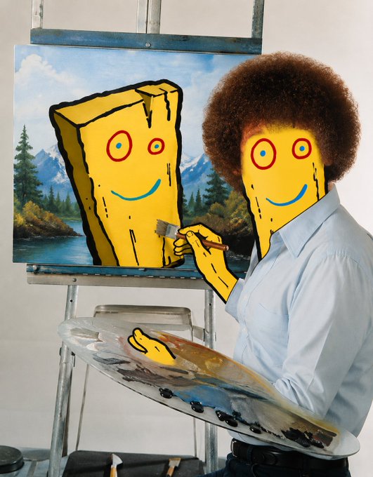 A cartoon-style figure with yellow skin, exaggerated red eyes, and an afro holds a palette and brush while "painting" a similar smiling wooden plank character on a canvas landscape, humorously illustrating the $PLANK art concept.