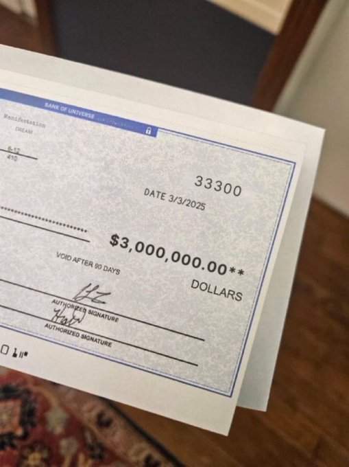 A novelty check from "Bank of Universe" made out to "Manifestation Dream" for $3,000,000.00, dated 3/3/2025, with check number 33300—tying into the post's theme of manifesting the number 333 for a big win.