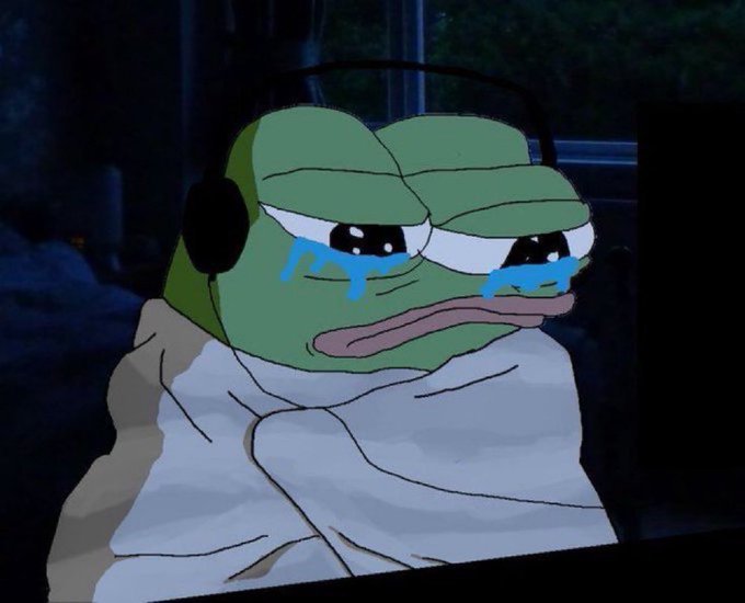 A sad Pepe the Frog wearing headphones cries while wrapped in a blanket, capturing the exhausted, anxious energy of someone pulling an all-nighter. The meme perfectly matches the late-night study grind for exams just hours away.