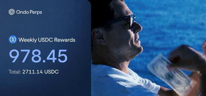 A promotional graphic for Ondo Perps displaying 'Weekly USDC Rewards' of 978.45 with a 'Total: 2711.14 USDC', overlaid on a blue-tinted image of a man in sunglasses.