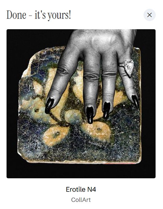 A black-and-white photo of a hand with long black nails and a ring resting on a speckled stone tile, captioned 'Done - it's yours!' with the text 'Ero tile N4' and 'CollArt' below.