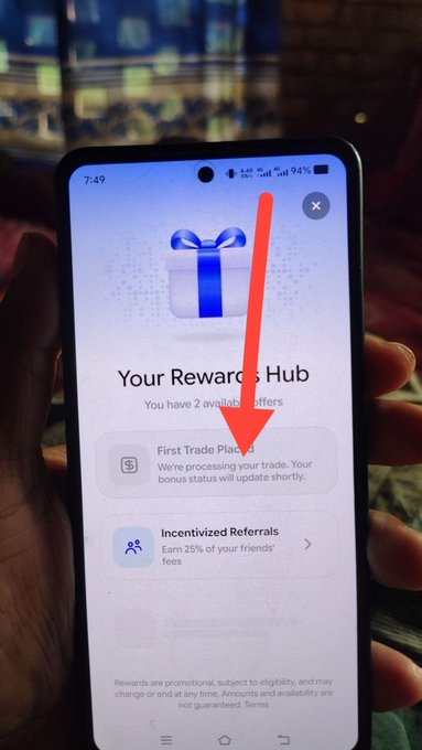 A smartphone displays a 'Your Rewards Hub' screen with a red arrow pointing to an 'Incentivized Referrals' offer, with text mentioning earning 25% of friends' fees.