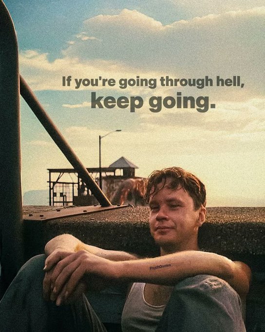 A movie still of a young man leaning against a vehicle with the overlaid quote 'If you're going through hell, keep going.' credited to PsycheDiaries.