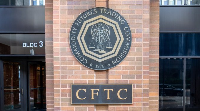 The image shows a brick building with a large sign that reads "CFTTC" above two entrances, one on each side of the building. The text at the bottom of the sign mentions that Nathan was able to witness this moment. At the top left corner of the building's facade is a smaller oval sign.