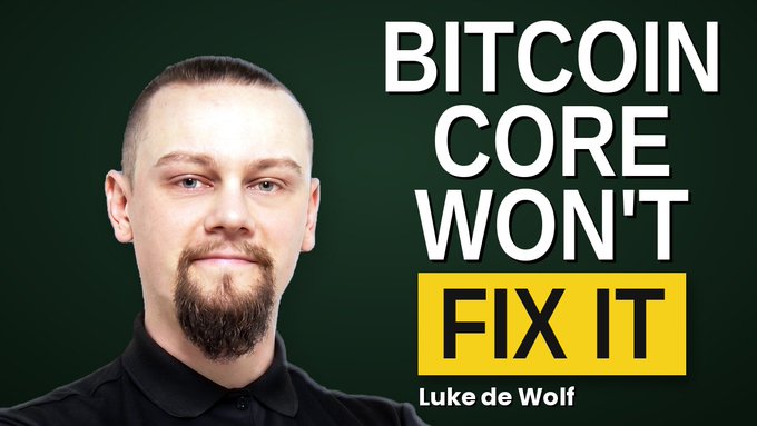 A thumbnail image showing a man with a goatee on the left and bold text reading "BITCOIN CORE WON'T FIX IT" by Luke de Wolf on the right, with "Watch!" likely prompting viewers to view his video on Bitcoin Core's shortcomings.