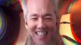 A heavily filtered, rainbow-distorted image shows a man laughing maniacally, conveying an unhinged or feverish intensity. The exaggerated, manic expression humorously reinforces the post's nonsensical suggestion to "hedge" Zcash (ZEC) by buying more of it, poking fun at the absurd crypto trading advice.