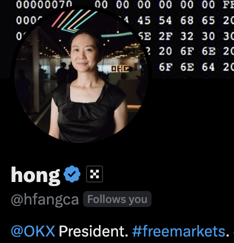 A social media profile screenshot for user "@hfangca" (display name "hong" with a verification checkmark) showing a woman in a black top, with the bio reading "@OKX President. #freemarkets." against a background of hex code digits.