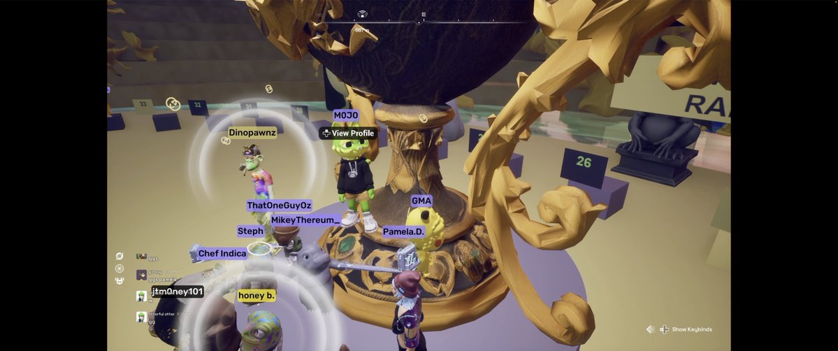 A screenshot from a video game showing multiple cartoon dinosaur avatars with names like 'Dinopawnz', 'MikeyTherem...', 'GMA', and 'Pamela.D.' gathered around a golden ornate structure.