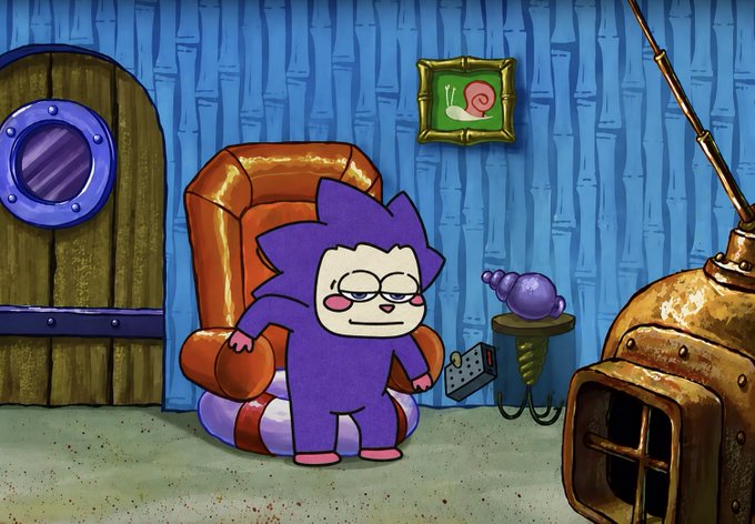 A purple anthropomorphic character with pink cheeks stands in a cartoonish underwater room, looking displeased near a chair, a TV set with a snail on screen, and a diving helmet. The scene humorously references the character's "retirement" or withdrawal, tying into the joke about "Phantom" quitting the Kuru Tournament and Monad.