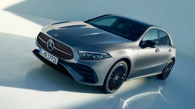A sleek silver 2021 Mercedes-Benz hatchback with the license plate "S MB 1771 E" and a prominent Mercedes star on the grille, representing the user's celebratory upgrade from their old Seat Ibiza after a successful $100k trading milestone on Polymarket.