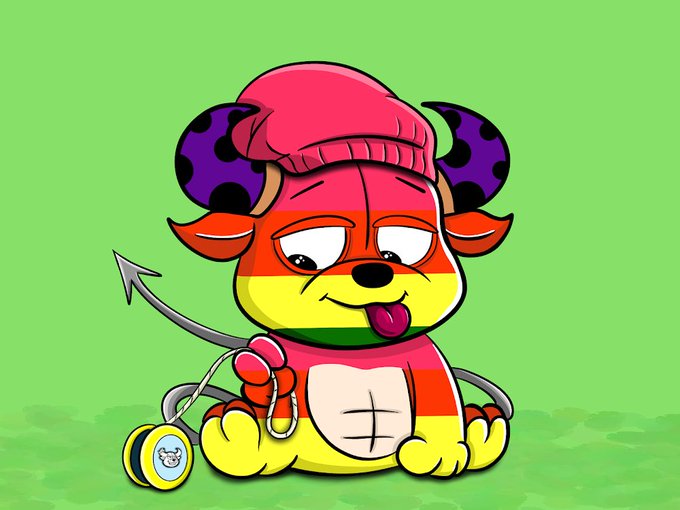A cartoon illustration of a rainbow-colored devil-like character wearing a pink beanie and featuring a trident tail, sitting on a green background with a pacifier nearby.