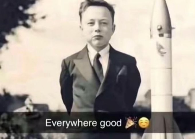 Black-and-white meme-style image of a young man in a suit standing beside a rocket, with the caption 'Everywhere good 🎉😊' overlaid at the bottom.