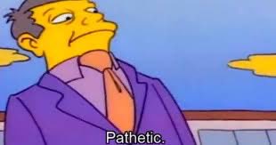 A cartoon character from *The Simpsons* looking disappointed with the caption "Pathetic." The image serves as a mocking response to the post's attempt to distance itself from risky "trenches" trading and specific crypto coins.